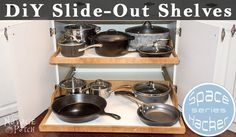 pots and pans are sitting on shelves in the kitchen