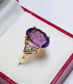 Beautiful Vintage 14k Yellow Gold Natural Amethyst Diamond Ring 100% Natural Amethyst Beautiful genuine Amethyst Amethyst 4.60CT Diamond(s) 0.06CT Color: G ]Clarity: SI1 Total ring weight: 4.6GR 14K Yellow Gold Ring sizing available Free of Charge For more information regarding this item feel free to reach me so I can accommodate your needs. Thank you Purple Fine Jewelry Birthstone Ring For Formal Events, Elegant Purple Birthstone Ring For Formal Occasions, Elegant Formal Purple Birthstone Ring, Fine Jewelry Yellow Gold Amethyst Ring With Accent Stones, Fine Jewelry 14k Gold Amethyst Ring With Accent Stones, 14k Gold Purple Diamond Ring, Yellow Gold Amethyst Ring With Accent Stones, 14k Gold Amethyst Ring With Accent Stones, Formal Purple Diamond Ring With Gemstone Accents