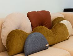 a couch with pillows on top of it