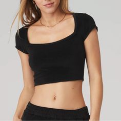 Nwt Alo Yoga Crop Top Trendy Alo Yoga Tops, Spring Fitted Alo Yoga Tops, Alo Yoga Fitted Solid Color Tops, Fitted Alo Yoga Tops, Fitted Solid Color Alo Yoga Tops, Alo Yoga Fitted Cropped Tops, Alo Yoga Black Top For Loungewear, Alo Yoga Casual Loungewear Top, Alo Yoga Casual Crop Top For Spring