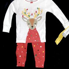 This 2 Piece Set Has A Cute Deer Tangled In Christmas Lights On The Front Of Shirt And Red Pants With Polka Dots Complete The Set. Playful Long Sleeve Holiday Sets, Playful Christmas Playtime Clothing Sets, Playful Cotton Sets For Holiday, Playful Christmas Playtime Sets, Cute Cotton Holiday Sets, Cute Cotton Sets For Holidays, Cute Festive Winter Sets, Cotton Sets For Playtime During Holidays, Christmas Playtime Sets With Long Sleeves