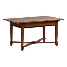 a wooden table sitting on top of a white background