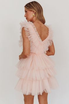 Blush, tulle mini dress Fully lined Layered, tiered frills throughout Zipper in side You'll be the belle of the ball in our gorgeous Froufrou mini dress. We are in love with its showstopping, layered frills throughout. Perfect for a birthday or homecoming. Team it with diamante heels and a clutch for a look that's fit for a princess. MODEL INFO Model is wearing size XS Height: 5'7" Bust: 32" Waist: 23.6" Hips: 32.5" CARE Hand Wash Cold. Do Not Iron. MATERIAL POLYESTER/SPANDEX Short Masquerade Dress, Pink Party Dress, Chic Tiered Mini Dress In Tulle, Pink Tule Mini Dress, Glamorous Tulle Mini Dress With Ruffles, Feminine Tulle Mini Dress With Ruffles, Spring Pink Tulle Mini Dress, Short Puffy Dresses, Tulle Dress Short