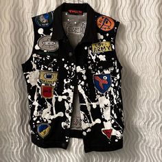 Rare Bass By Ron Bass Graphic Vest Stretch Denim Vest Xl Artistic Punk Excellent Condition Like New Without Tags Button Front Vest With A Total Of 4 Pockets. Cool Patches And Studs. Rare Vest You See Them In Blue But Not Seen Another That's Black. Pictures Are Part Of My Description So Please Flip Them Over Carefully Please See Pictures For Measurements Thank You For Looking And Please Check Out My Other Items For Sale Punk, Christian, Street Wear, Painter, Graffiti, Artist, Hip Hop, Studs, Pain Denim Vest With Patches, Cotton Denim Vest For Winter Streetwear, Summer Black Denim Vest For Streetwear, Trendy Black Cotton Denim Vest, Urban Black Cotton Denim Vest, Urban Denim Vest For Winter Streetwear, Urban Winter Denim Vest For Streetwear, Punk Denim Vest For Fall Streetwear, Punk Style Denim Vest For Fall Streetwear