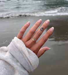 Immerse yourself in the enchantment of the Spirit of the Sea Ring, a delicate treasure fit for a mermaid. Its golden glow evokes moonlit shores and hidden realms beneath the waves. With each wear, feel the echoes of ancient tales and the call of the tides. Let this ring remind you of untamed beauty and limitless possibilities that reside within you. Each ring is made to order, please allow 2-3 weeks for the magic to happen Please contact me if you don't see your size listed I handcrafted this ri Sea Inspired Rings, Mermaid Engagement Ring, Surfer Nails, Seashell Rings, Sea Ring, Chloe Brand, Sea Rings, Seashell Ring, Surfer Jewelry