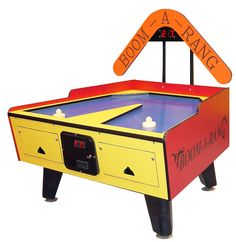 an arcade game table with a sign above it that says, boom - a - bang