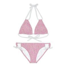 Adorable swimsuit with the rosy pink ditsy floral designed by Paula. Made with 4-way stretch Tricot (82% Microfiber, 18% Spandex), this strappy bikini set is the perfect companion to all swimming and beach adventures.  .: Material: 82% microfiber polyester, 18% spandex .: Medium fabric (7.5 oz /yd² (250 g/m .: Two piece swimsuit .: 7 strap colors to choose from .: Adjustable elastic straps .: Removable cups .: Assembled in the USA from globally sourced parts .: Seam thread color automatically matched to design (black or white) Designed and assembled in the USA Pink Swimwear With Adjustable Straps For Summer, Pink Swimwear With Adjustable Straps For Pool, Adjustable Pink Swimwear For Pool, Pink Strappy Swimwear For Swimming, Pink Adjustable Strappy Swimwear, Adjustable Swimwear For Spring, Pink Strappy Swimwear For The Pool, Adjustable Pink Beachwear Swimwear, Pink Strappy Swimwear For Pool