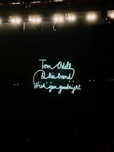 the stage is lit up with bright lights and some words on it that read,'tom cole diamond will you go tonight? '