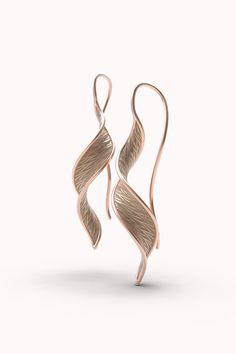 Gold earrings available in 18k or 14k real solid gold* Long Gold Earrings Made in Italy* Twisted gold earrings designed and crafted in Italy Stunning earrings made from a continuous solid gold ribbon that elegantly hangs from a long ear wire. Long twisted earrings crafted in polished and raw gold 18k or 14k. Ear wire earrings made in Italy. Modern and symmetric long earrings in genuine solid gold. Customizable Materials 14k solid yellow gold, white gold, rose gold (processing times for 14k rose 14k Gold Earrings With Shiny Finish, 14k Rose Gold Pierced Earrings, Rose Gold Polished Finish Earrings As Gift, Rose Gold Earrings With Polished Finish Gift, Rose Gold Polished 14k Gold Earrings, Rose Gold 14k Gold Earrings With Polished Finish, Rose Gold Polished Earrings Gift, Elegant Rose Gold Wrap Earrings With Ear Wire, Rose Gold 14k Polished Earrings