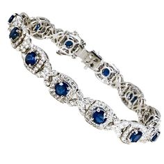 18k Bracelet with 12 round sapphiress weighing approximately 8.00 carats and diamonds weighing approximately 7.00 carats. 22.02 grams Yoke Pattern, Goth Wardrobe, Short Sweater, Fair Isle Sweater, Blue Bracelet, Fair Isle, Extra Long, Diamond Bracelet, Design Features