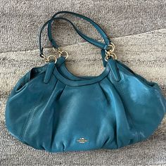 New Without Tags Women’s Medium Size Handbag, Teal Leather Chic Blue Handheld Hobo Bag, Elegant Blue Soft Leather Satchel, Elegant Blue Hobo Bag For Everyday Use, Elegant Blue Hobo Bag With Detachable Strap, Elegant Blue Hobo Bag For Daily Use, Blue Bags With Gold-tone Hardware For Errands, Elegant Blue Hobo Bag For Travel, Elegant Blue Hobo Bag For Shopping, Blue Coach Bag For Everyday Use