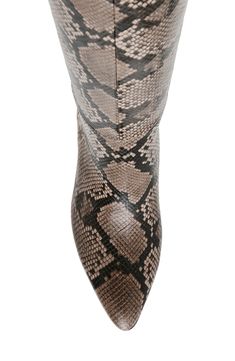 Bold snakeskin embossing puts an energetic spin on this look-defining knee-high boot grounded by a lightly cushioned footbed and flexible sole. 2 1/2" heel 15" shaft; 14" calf circumference Cushioned footbed iFlex technology provides 90-degree bend for superior comfort and flexibility Synthetic upper and lining/rubber sole Imported Snake Skin Boots, 90 Degree, Anne Klein, Emboss, Knee High Boots, Snake Skin, Bend, Knee High, Rubber Sole