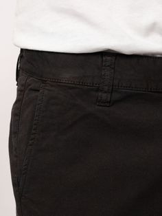 Slim fit four-pocket chino made in a clean 11.7 oz. organic comfort stretch twill. With its slanted front pockets, welt back pockets, chain stitch hems, and slim tapered fit it is a contemporary classic. If you ask us it is the perfect slim fit chino - fitted with a bit of room around the legs, making it look neat and fit very comfortably. Its sewn with heavy tone-in-tone thread with medium-short stitch length which emphasizes its clean construction and pays homage to its workwear heritage. Straight Leg Chinos With Welt Pockets For Streetwear, Straight Leg Chinos For Streetwear, Straight Leg Chino Twill Chinos For Streetwear, Straight Leg Chino Cotton Twill Chinos For Streetwear, Tapered Leg Chino Cotton Twill Chinos For Streetwear, Streetwear Chinos With Tapered Leg, Streetwear Chinos With Hip Pockets, Tapered Leg, Urban Tapered Leg Chinos For Workwear, Chino Cotton Twill Chinos With Belt Loops