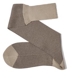 Viccel Beige Brown Birdseye Over The Calf Socks The Fil d'Ecosse Beige Brown Birdseye Over The Calf Socks will elevate your formal look. Durable and made from the most superior Fil d'Ecosse these men's socks are hand-finished creating a premium men's sock, available in a large range of colours. We designed with comfort and style in mind, Viccel Beige Brown Birdseye Over The Calf Socks from Viccel Dress socks will become your go-to socks of the season. They complement a crisp pair of denim jeans Beige Stretch Cotton Socks, Stretch Cotton Socks In Beige, Beige Fitted Knee-high Socks, Stretch Beige Cotton Socks, Classic Fitted Beige Socks, Suit Socks, Beige Socks, Mid Calf Socks, Over The Calf Socks