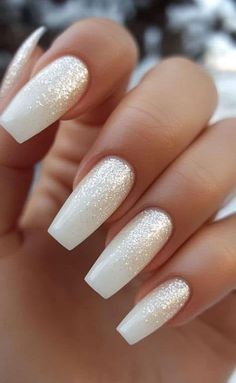 White Nails Glitter Accent, White Glitter Nails With Designs, White Nails With Black Glitter, White Gold Glitter Nails, White Ombre Sparkle Nails, White Nails With White Glitter, Sparkling White Nails, White Sparkle Ombre Nails, Holiday White Nails