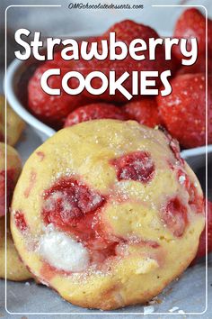 strawberry cookies with powdered sugar and fresh strawberries in the background text reads, strawberry cookies