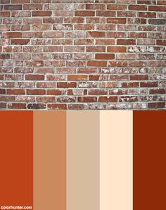 a brick wall with different shades of brown and tan in the center, along with other colors