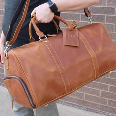 "Handmade Item %100 Genuine Leather - Best Quality Oil-Tanned Full Grain Cowhide Leather Leather Duffle Bag, Mens Leather Weekend Bag, Perspnalized Duffel Bag, Leather Holdall Bag, Leather Overnight Bag, Leather Gym Bag for Men, Gift Duffle Bag, Travel Bag, Personalized Groomsmen Gift, Custom Leather Duffle Bag Bag, Leather Personalized Gift, Mens Weekend Bag, Father's Day Gift, Birthday Gift, Gift for Him SIZES: 20\" x 11\" x 10\" inches PERSONALIZATION INSTRUCTIONS We will do the personalizati Gym Bag For Men, Leather Gym Bag, Leather Overnight Bag, Mens Weekend Bag, Mens Gym Bag, Leather Holdall, Leather Dopp Kit, Mens Toiletry Bag, Leather Duffel Bag