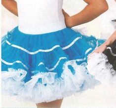 This is a brand new  dance costume skirt in turquoise and white, ladies small adult, ladies large adult or child medium (that is the only 2 sizes I have) you do not get the leotard shown on the model. It is a 2 layer heavily ruffled skirt. The topskirt is a tiered and ruffled organdy with white satin ribbon trim. The waistband is a white 2 inch elastic with a ton of stretch.The manufacturer is Main Street Dancewear (a division of Wolff Fording) so you know the quality is exce Dance Petticoat With Ruffles And Stretch, Stretch Petticoat With Ruffles For Dance, White Fitted Petticoat For Dance, Summer Dance Petticoat With Attached Cancan, Summer Petticoat With Attached Cancan For Dance, Fitted Dance Petticoat, Summer Dance Fitted Petticoat, Fitted Petticoat With Attached Cancan For Dance, Fitted Ballet Petticoat For Dance