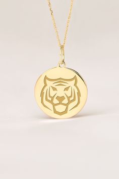 If you wish we can personalize your 14k Solid Gold Tiger Necklace. A Dainty and unique gift for Birthdays, Graduations, Weddings and Anniversaries. ● MATERIAL 14k SOLID GOLD ● Chain Length or Without Chain - Without Chain - 40 cm / 16 inches - 45 cm / 18 inches - 50 cm / 20 inches ● PENDANT SIZE [The jump ring (bail) is not included in the measurements] - 13 mm / 0.51 Inches diameter - 14 mm / 0.55 Inches diameter - 15.3mm / 0.6 Inches diameter - 16.5mm / 0.65 Inches diameter - 19 mm / 0.75 Inch Yellow Gold Charm Necklace As A Gift, Custom Yellow Gold Necklace With Polished Finish For Gift, Custom Yellow Gold Necklace With Polished Finish As Gift, Customizable Yellow Gold Necklace Gift, Engraved Yellow Gold Charm Necklaces As Birthday Gift, Engraved Yellow Gold Charm Necklace For Birthday, Engraved Yellow Gold Charm Necklace For Birthday Gift, Gold Jewelry With Certificate As A Gift, Gold Jewelry With Certificate For Gift