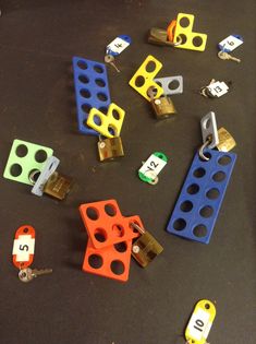 several legos are laying on the floor next to each other with numbers and keys