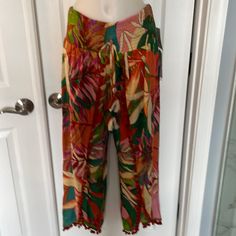 Nwt Sold At Anthropology True Destinations Resort Wear Beautiful Long Pants That Have Open Legs They Have Tiny Pom Poms And A Tie Large Elastic Waistband Pinks Green Orange Yellow Beach Wear Or Vacation Coastal Pool Wear Pull-On Style Very Stretchy Waist Measure 15 Unstretched To Like 17-18 100%Rayon Multicolor Trousers For Vacation, Multicolor Vacation Pants With Elastic Waistband, Multicolor Wide Leg Beach Bottoms, Multicolor Pants With Elastic Waistband For Beach Season, Multicolor Vacation Pants With Pockets, Multicolor Vacation Pants For Spring, Multicolor Pants For Spring Vacation, Multicolor Spring Vacation Pants, Multicolor Beach Season Pants