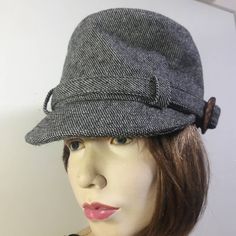 Belted Brown Button Notch 70% Wool, 30% Acrylic. Do Not Wash, Dry Clean Only. Casual Adjustable Wool Cloche Hat, Gray Wool Casual Hat, Casual Brimmed Hat For Work, Casual Gray Wool Hat, Gray Adjustable Cloche Hat With Short Brim, Adjustable Brimmed Gray Cloche Hat, Crochet Slouch Hat, Tweed Hat, Crochet Slouchy Hat