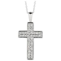 0.35 Carat Natural Diamond Cross Necklace 14K White Gold G SI 18 inches chain 100% Natural Diamonds, Not Enhanced in any way Round Cut Diamond Necklace 0.35CT G-H SI 14K White Gold Pave style 3.00 gram 1 inch in height, 1/2 inch in width 38 stones N5393WD ALL OUR ITEMS ARE AVAILABLE TO BE ORDERED IN 14K WHITE, ROSE OR YELLOW GOLD UPON REQUEST. All Chains of Pendants and Necklaces Can be Requested in 16'' or 18'' Length. . This item is proudly handcrafted in the USA. Perfect gift on any occasion. This Item has passed highest quality inspections. We want you to Wear it, Enjoy it, and Show it off! In case you are not 100% satisfied with this exquisite, elegant and lovely item we have a no hassle 30 day money back return policy. Please message our support team for any questions. Anniversary Necklace With Pave Setting Cross Pendant, Anniversary Cross Pendant Necklace With Pave Setting, White Gold Cross Pendant Necklace With Pave Setting, Anniversary Cross Necklace With Pave Setting, Classic Brilliant Cut Cross Pendant Necklace, Classic Cross Pendant Necklace With Brilliant Cut, Formal Cross Pendant Necklace With Pave Setting, Diamond Cross Necklace With Polished Finish, Classic Cross Pendant Necklace With Pave Setting