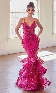 Sweet and sassy, this long tiered mermaid prom dress is as feminine as it is sparkly. With scattered sequins and 3-D floral embellishments from the deep v-neckline to the hem, this fabulous long formal dress shimmers with every move you make at prom, galas, and other black-tie events. The gorgeous sequin-embroidered long evening gown has a sheer corset-style waist that wraps around to the lace-up back, while the hip-skimming long mermaid skirt flows to the floor in fluffy ruffled tiers that are Mermaid Prom Gown, Mermaid Gown Prom, Floral Applique Dress, Mermaid Glitter, Cinderella Divine, Mermaid Prom Dress, Trumpet Skirt, Boned Bodice, Sleeveless Gown