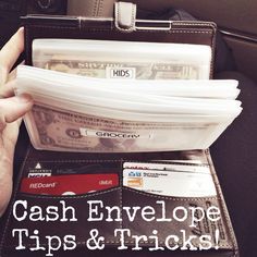 cash envelope tips and tricks in the back seat of a car with someone holding their wallet