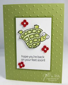 a close up of a card with a turtle on it