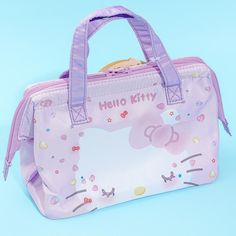 Take your favorite home-cooked meals to school or work using this kawaii lunch bag! It has a wide-mouth metal clasp opening so you can easily place your bento box and utensils easily. The lunch tote is also decorated with a special print of Hello Kitty with dreamy eyes — a design made especially for Hello Kitty’s 50th-anniversary celebration! Made from polyester Inner lining is made from insulated aluminum material Comes with dual zipper closures and an inner mesh pocket for ice packs Hello Kitty Rectangular Bag For Daily Use, Kawaii Hello Kitty Print Rectangular Bag, Hello Kitty Lunch Bag, School Bags With Hello Kitty Print, Rectangular Shape, Hello Kitty Print Shopping Bag, Rectangular, 50th Anniversary Celebration, Lunch Tote, Sanrio Characters, Anniversary Celebration