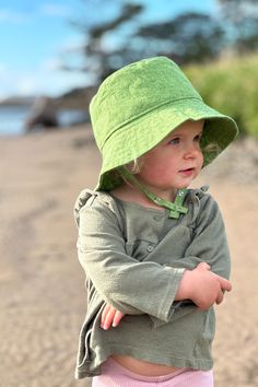 Discover the perfect balance of style, comfort, and protection with our Baby Linen Bucket Hat. Designed for toddlers and babies, this linen bucket hat will keep your little one safe from the sun while adding a chic touch to their summer wardrobe. With the versatile linen fabric, this hat is not only stylish but breathable and gentle on your baby's skin. Don't let your baby miss out on the perfect summer accessory - shop now! Baby Bucket Hat, Baby Summer Hat, Beach Bucket Hat, Summer Bucket Hat, Fabric Clothes, Summer Ray, Baby Summer, Baby Sun Hat, Girl Beach