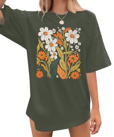 PRICES MAY VARY. MATERIAL: This oversized flower shirt is made of 60% cotton, 35% Polyester,5% Spendex, soft and comfortable. The fabric is lightweight, and the clothes adopt high-quality printing technology, and the pattern is clear and natural. SPECIAL DESIGN: This oversized flower graphic shirts for women, cute botanical t-shirt, summer wildflowers lover tee, Boho floral graphic, cute casual round neck, vintage floral graphic tees, cute flower short sleeve shirt with unique design makes it po Boho T Shirt Design, Clothes Adopt, Hiking T Shirt, Summer Wildflowers, Wildflower Shirt, Tshirt Oversized, Spring T Shirts, Hiking Tshirt, Nature Life