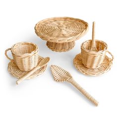 three wicker baskets with spoons and two bowls on them, one is empty