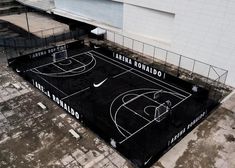 an aerial view of a basketball court in front of a building with the name arena ronaldo written on it