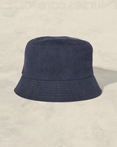 Fun Vintage Washed Cotton Twill Fabric Bucket hat, perfect for summer! One Size Fits Most (60cm) Imported Blue Bucket Hat With Curved Brim For Vacation, Blue Curved Brim Bucket Hat For Vacation, Blue Lightweight Casual Bucket Hat, Blue Flat Brim Bucket Hat One Size, Blue Flat Brim Bucket Hat, Casual Lightweight Blue Bucket Hat, Blue Lightweight Bucket Hat With Short Brim, Navy Wide Brim Bucket Hat For Summer, Lightweight Blue Bucket Hat