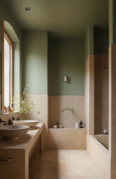 a bathroom with two sinks and a bathtub