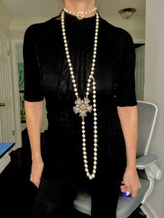 If you’re looking for Red Carpet regal or a smashing statement piece that can be worn several ways this is your girl. We Used cream glazed pearls with an incredible vintage brooch/pendant which we hand painted with 14k gold to highlight the design. Hook and eye allow you to wear several ways. One of a kind, and only one available. Long Pearl Necklace For Evening, Elegant Evening Holiday Jewelry, Vintage Pearl Embellished Jewelry Gift, Vintage Jewelry For Holiday Parties, Vintage Holiday Jewelry For Party, Elegant White Holiday Necklaces, Vintage Holiday Party Jewelry, Holiday Party Vintage Jewelry, Vintage Pearl-embellished Jewelry For Formal Occasions