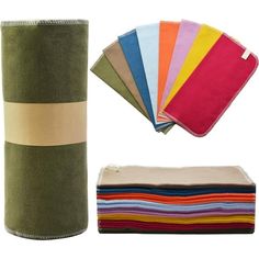 a roll of cloth next to several different colors