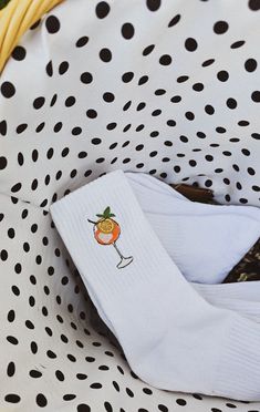 High quality embroidered socks! Composition: 85% combed cotton, 10% polyamide fiber, 5% elastane. These socks are made from combed cotton for a comfortable and non-shrinking fit. Step up your sock game with these fun Aperol Spritz Embroidered Socks! These stylish white socks feature a detailed embroidered design of the iconic Aperol Spritz cocktail, perfect for adding a playful touch to your wardrobe. Whether you're gifting a cocktail lover or treating yourself, these cozy socks blend comfort an White Cotton Socks For Gifts, White Cotton Socks As A Gift, White Cotton Socks As Gift, Fun White Socks As A Gift, Fun White Socks As Gift, Summer Cotton Socks For Gifts, Fun Cotton Socks For Gifts, Embroided Socks, Employee Outfit