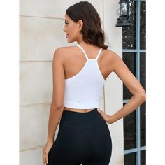 Elevate your workout wardrobe with the WhizMax Women's Spaghetti Strap Camisole Tank, a seamless blend of style and functionality. This ribbed, cropped tank top doubles as a sports bra, ideal for yoga, gym sessions, or everyday casual wear.

- **Size**: Medium (fits 8-10)
- **Color**: White
- **Material**: 95% Rayon, 5% Spandex
- **Gender**: Female

Designed with a non-padded structure for a comfortable, unrestricted feel, this top is perfect for low-impact activities. The soft and stretchy fabr Layering Tank Tops, Supportive Sports Bras, Cropped Camisole, White Cami, High Neck Tank, Yoga Bra, Cropped Cami, Womens Aprons, Ribbed Tank Tops