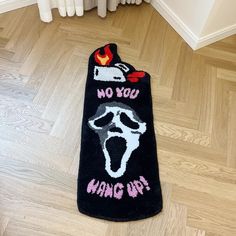 a towel that says no you hang up on the floor next to a radiator