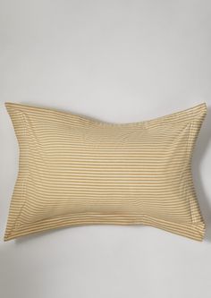 the pillow case is made from ticking fabric