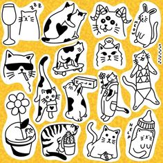 a bunch of cats that are drawn in black and white on a yellow paper background