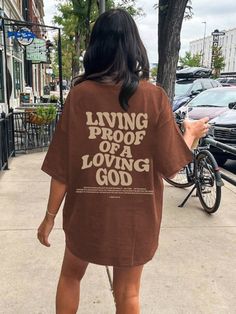 Plus Size Loose Fit Casual Summer T-Shirt With Slogan And Drop Shoulder Design LIVING PROOF OF A LOVING GOD Graphic Tees Women Tops Coffee Brown Casual  Short Sleeve Fabric Letter,Slogan  Slight Stretch Spring/Summer/Fall Women Plus Clothing, size features are:Bust: ,Length: ,Sleeve Length: Tshirt For Women Casual, Oversized T-shirt With Front And Back Print For Summer, Cheap Oversized T-shirt For Summer, Cute Oversized Spring T-shirt, Oversized Tshirt Women, Affordable Oversized T-shirt With Back Print, Friday Fits, Tee Shirt Oversize, Oversized Brown T-shirt With Text Print