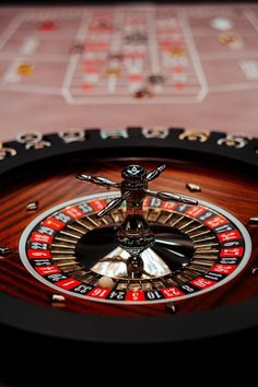 a close up of a casino rouleet on a table