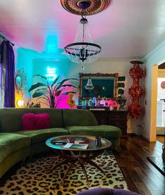 a living room filled with furniture and colorful lights