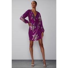 Ny & Company Long Sleeve Sequin Wrap Dress In Color Violet Gem Scs.This Showstopping Wrap Cocktail Dress Will Have You Glowing With Style. Crafted With A Stunning Wrap Silhouette And Surplice Neckline, This Dress Is Adorned With Sparkling Sequins And Delicate Floral Details. Dress Is New With Tags In Women's Size Large.Please See Pic #4/ Website(Ny&Company)Sizing Chart For Measurements.Approximate Length:37”. Product Details: Wrap Dress. Surplice Neck. Long Sleeve. Sequined. Floral Details Spark Fitted V-neck Sequin Dress For Spring, Purple Fitted Sequin Dress For Spring, Purple Sequined V-neck Dress, Fitted Purple Sequin Dress For Spring, Long Sleeve Purple Cocktail Dress, Fitted V-neck Mini Dress For Festive Occasions, Fitted V-neck Midi Dress For Festive Occasions, Long Sleeve Sequin Dress For Spring Formal, Chic V-neck Mini Dress For Festive Occasions