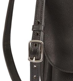 Amish Handcrafted Leather Equestrian Purse Double Horse Hoof Pick & Loop Closure Shoulder Bag Hand tooled from the finest leather, this unique equestrian purse has dual authentic hoof picks which serve as a secure closure when slipped into leather loops. This unique bag is crafted with the finest leather, hardware & skill to ensure years of use. Small → 9" x 7", has adjustable shoulder strap, outside back pocket and 2 interior pockets. Medium → 10" x 10", has adjustable shoulder strap, o Hoof Pick, Horse Hoof, Unique Purses, Leather Hardware, Hand Tooled Leather, Unique Bags, Leather Shops, Handcrafted Leather, Dark Brown Leather